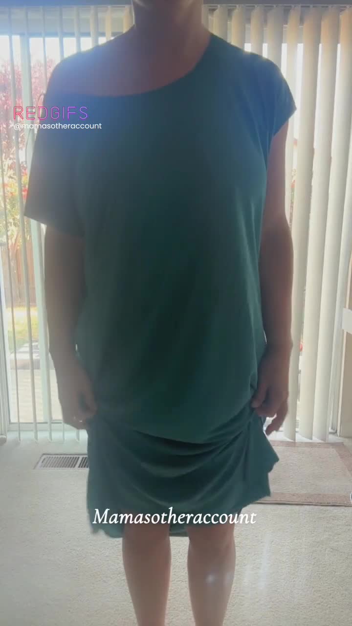What mom is hiding under her nightgown ;)